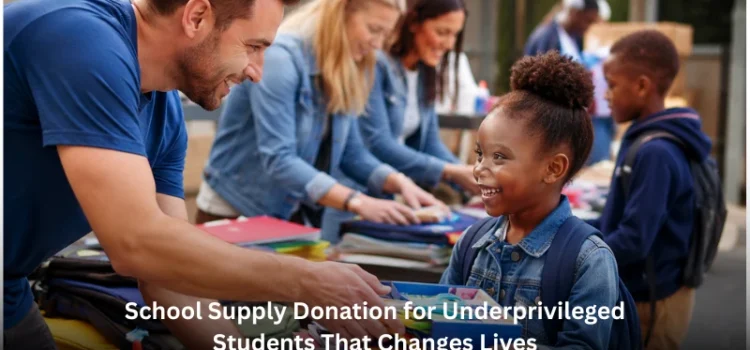 A friendly female volunteer smiling while handing a navy blue backpack filled with notebooks to a young boy at a school supply donation event.